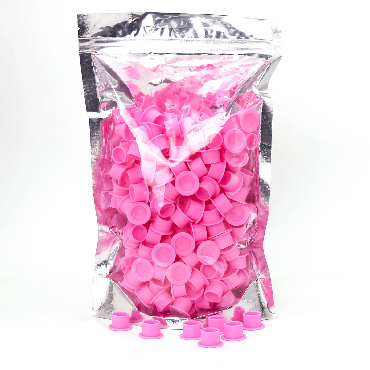 Pink Silicone Ink cups inside of packaging on a white background
