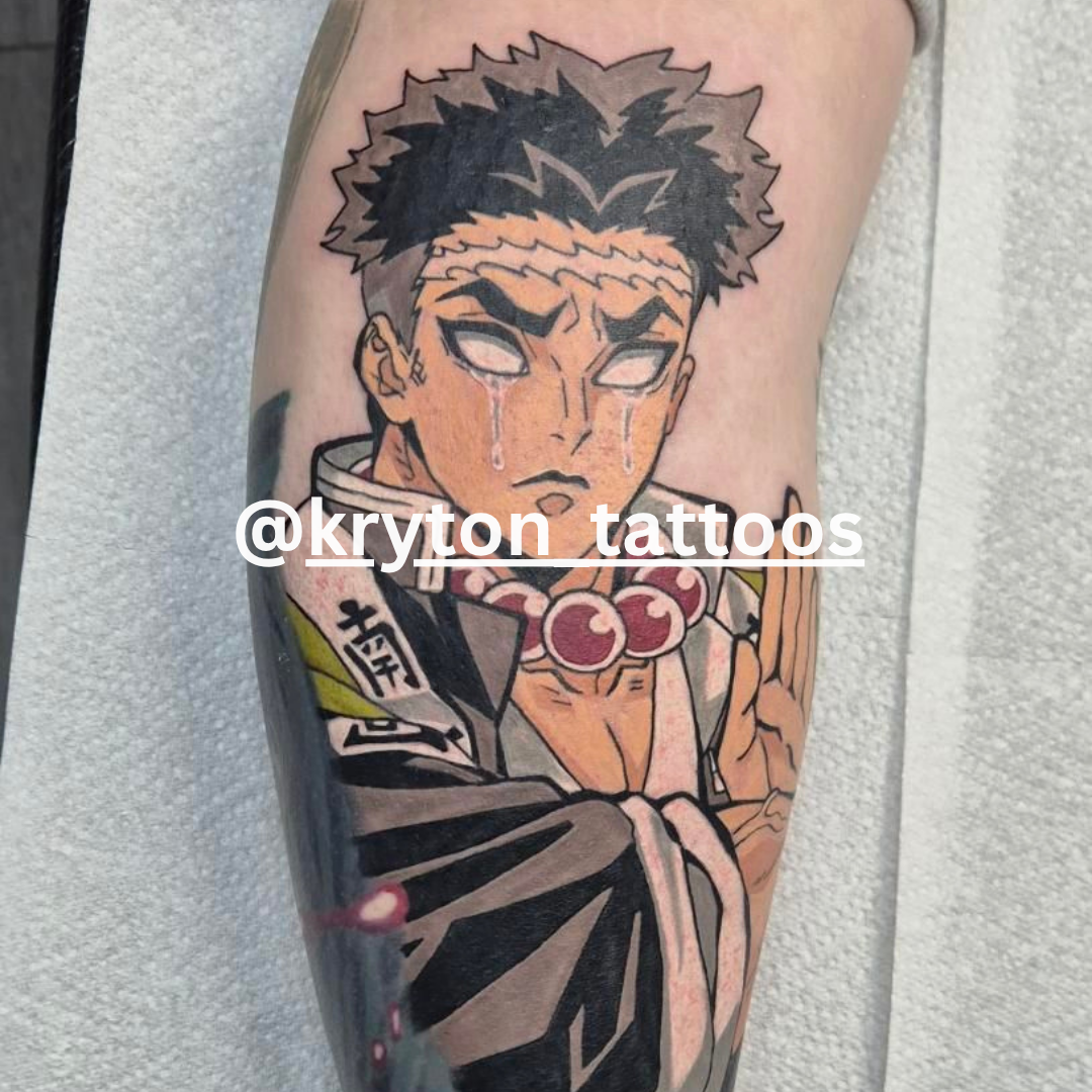Tattoo of an anime character on a person's arm with 'kryton tattoos' branding.
