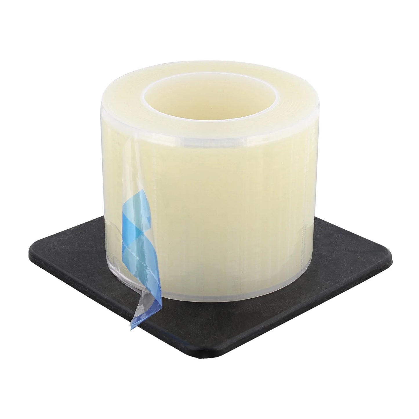 Clear barrier film in black coaster with a white background