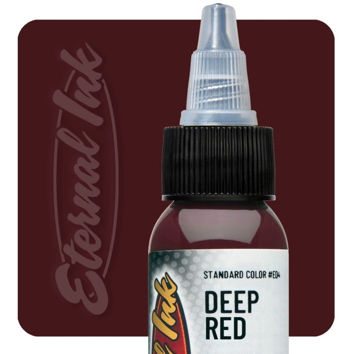 Bottle of Eternal Ink Deep Red tattoo ink on a dark red background