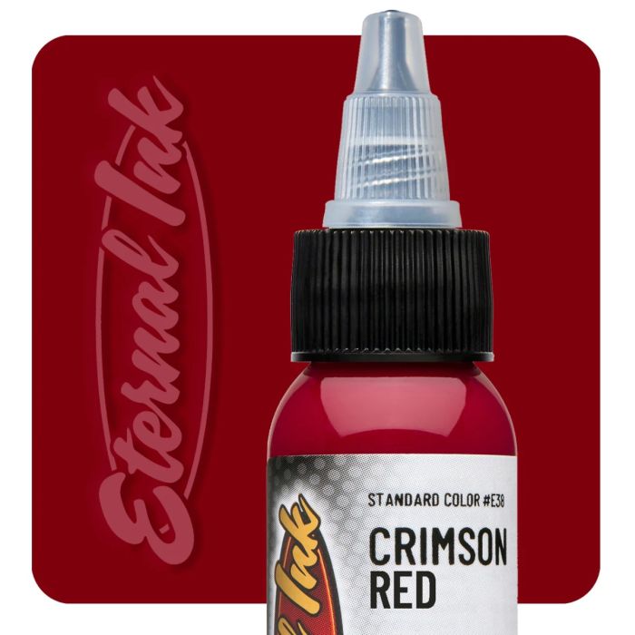 Bottle of Crimson Red tattoo ink with 'Eternal Ink' branding on a red background
