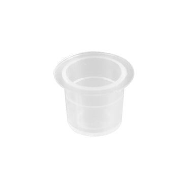 White plastic ink cup for tattoo ink on a white background