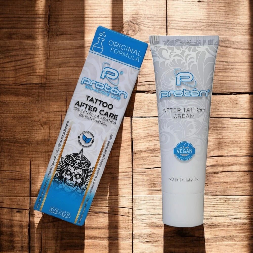 Proton Tattoo After Care packaging on a wooden surface