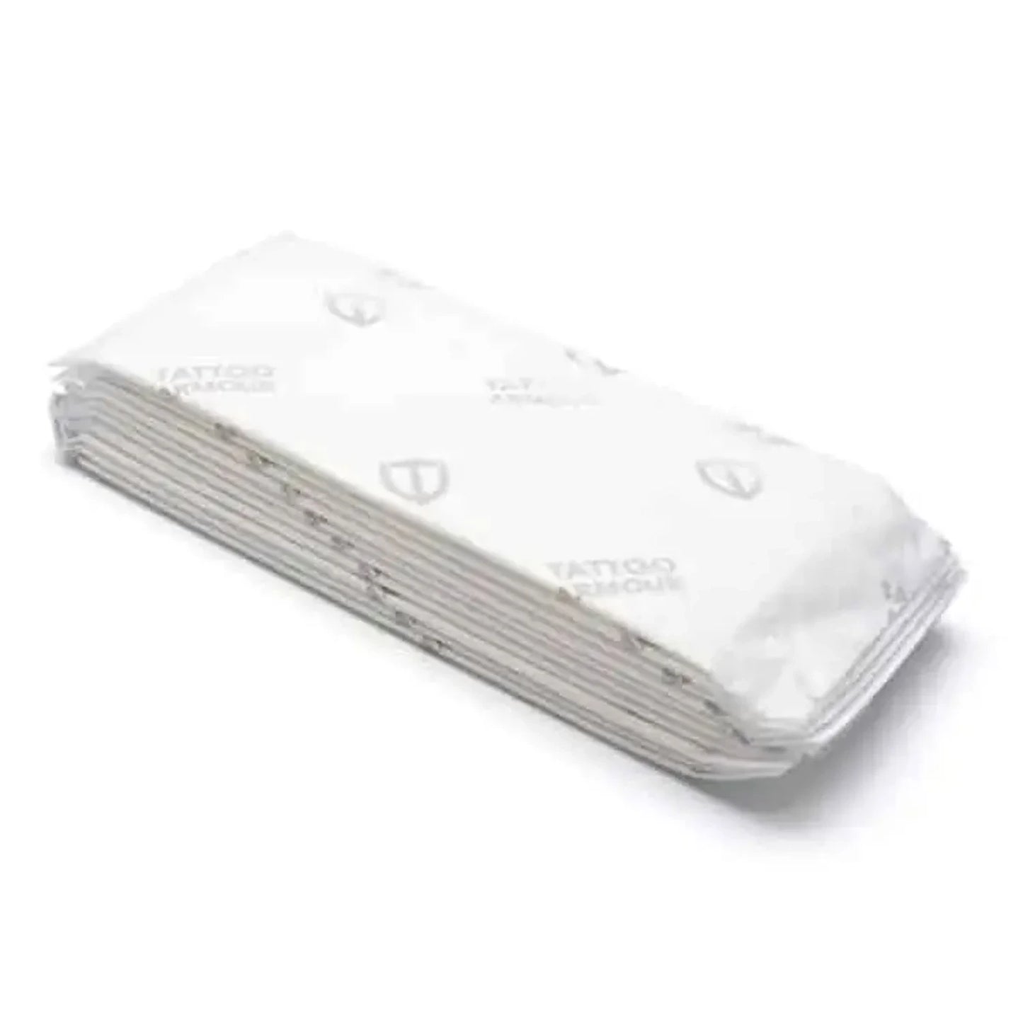 Tattoo armour dressing pads Stack of white paper towels with 'Tattoo' branding on a white background