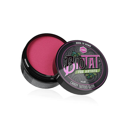 Biotat candy tattoo glide jar, with open lid showing the pink glide inside of it, on a white background