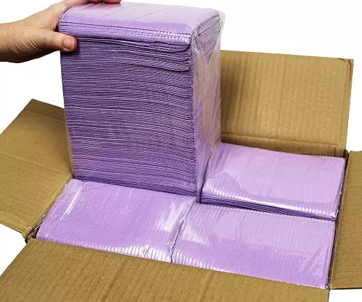 Purple tattoo station towels with fluid-proof backing