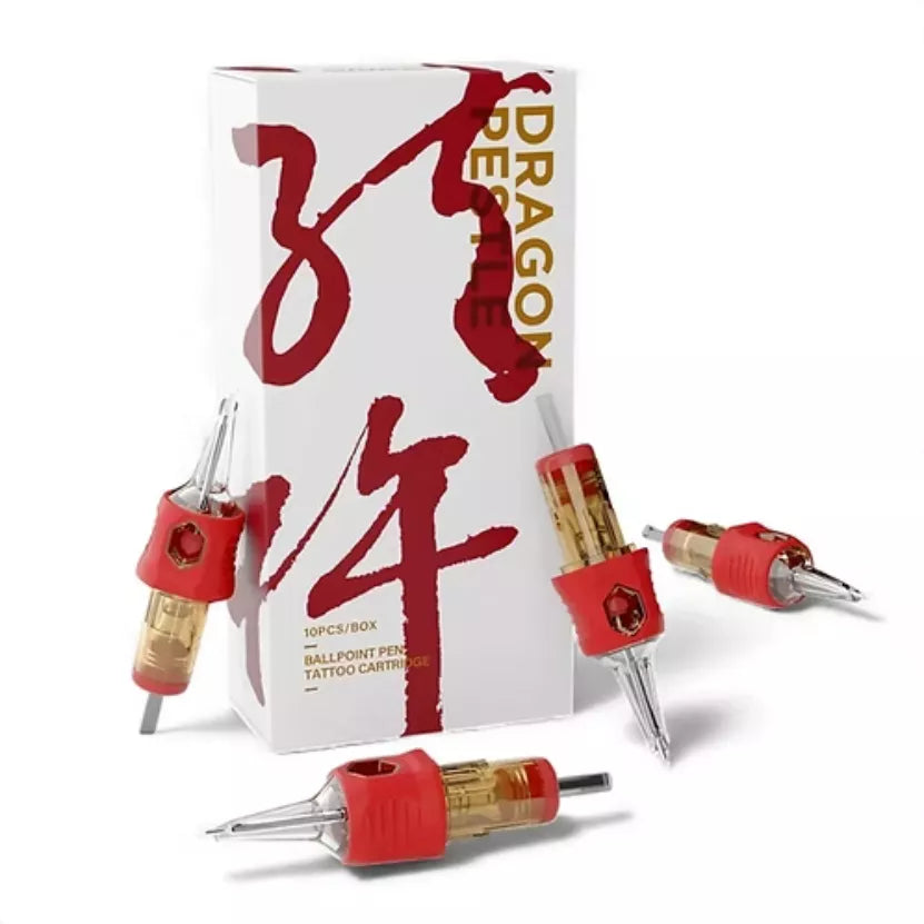 Box of Dragon PESTLE ballpoint pen tattoo cartridges with several red and gold cartridge tips arranged around it on a white background.