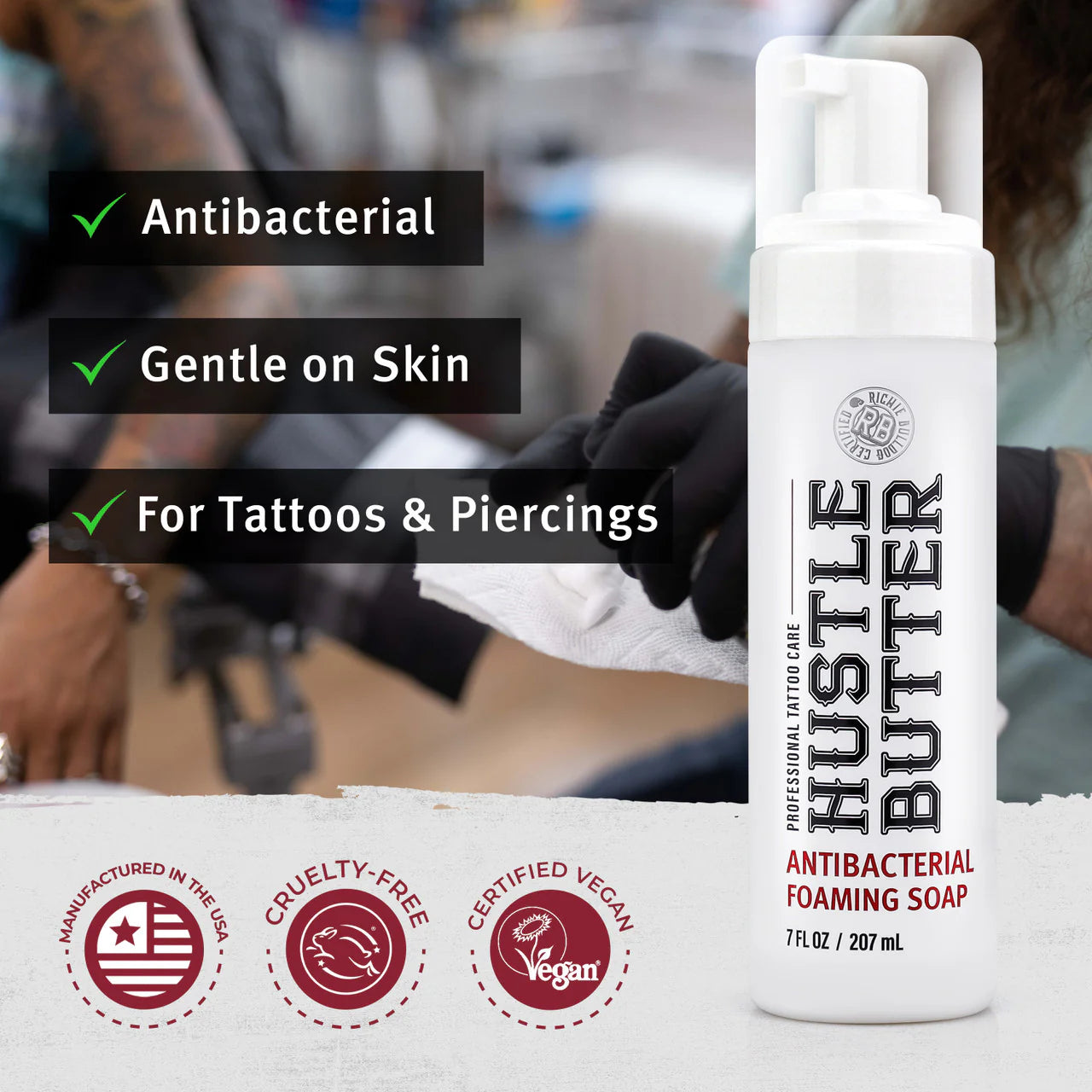 Hustle Butter antibacterial foaming soap bottle with product features and branding details.
