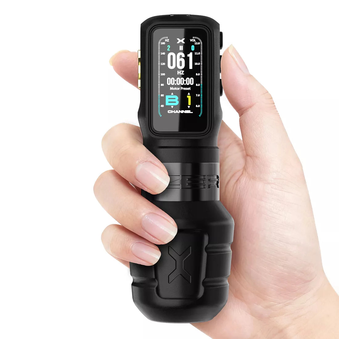 Hand holding a black Ozer X Channel wireless tattoo machine with a digital display on a white background