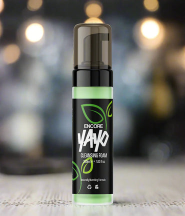 Yayo Encore cleansing numbing foam with a green label on a blurred background