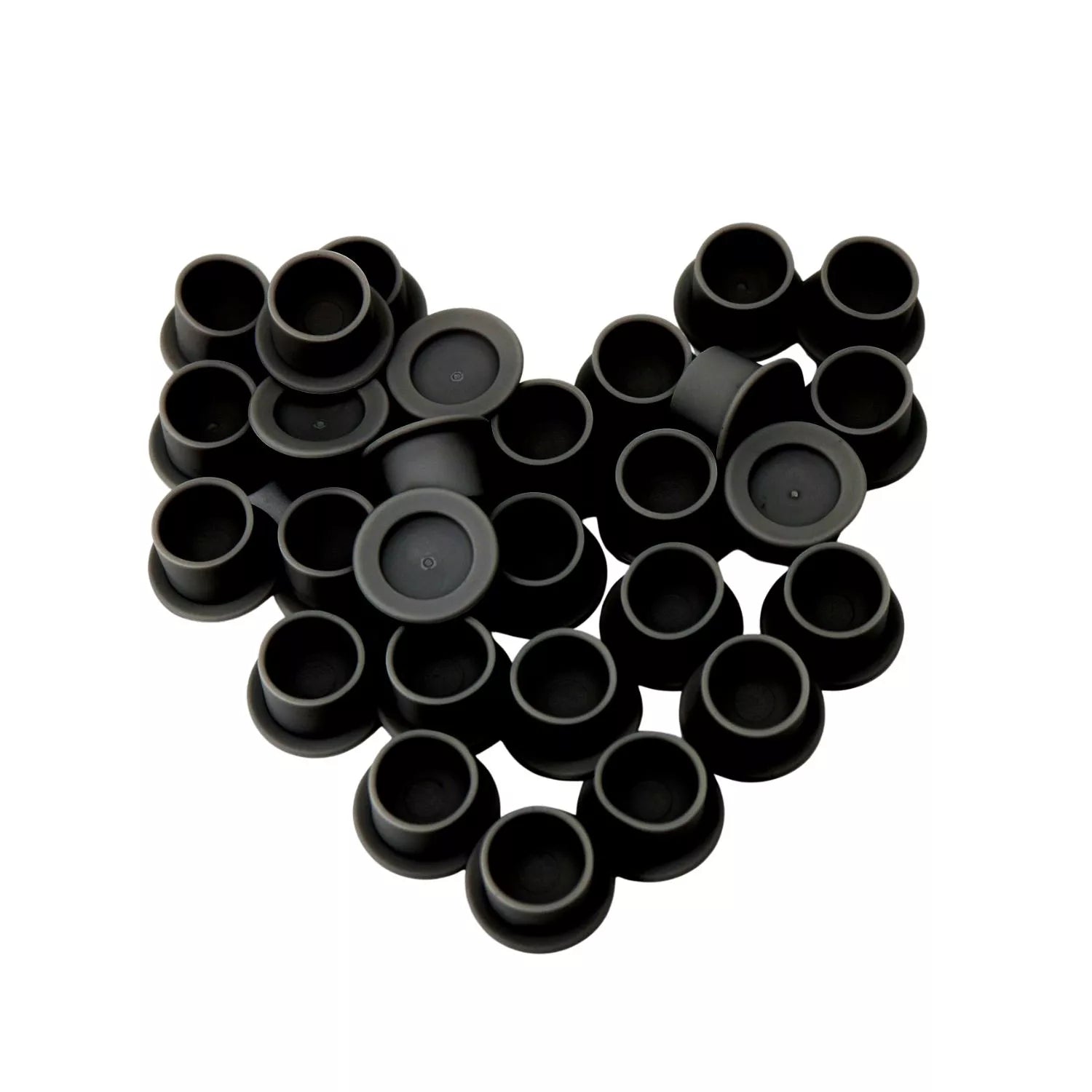 Black silicone ink cups on white background