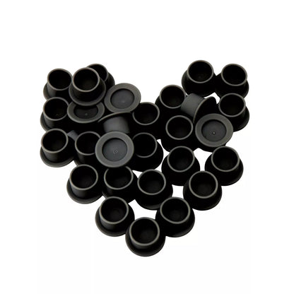 Black silicone ink cups on white background