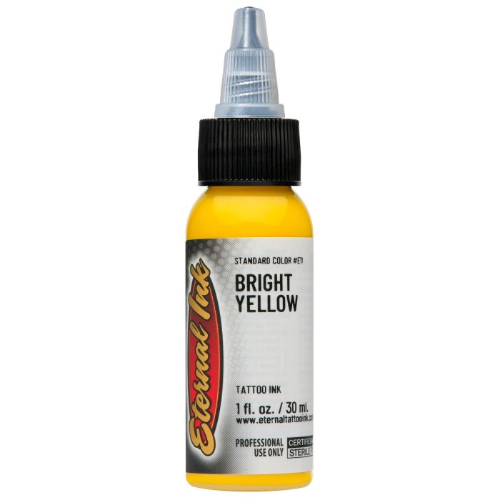 Bottle of Eternal Tattoo bright yellow ink on a white background