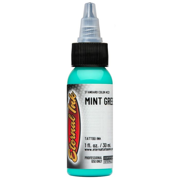 Bottle of mint green tattoo ink with a visible brand label on a white background