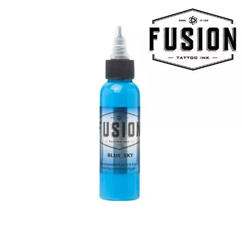 A bottle of Fusion Tattoo Ink in the shade Blue Sky, featuring a bright blue liquid inside a clear bottle with a black cap, shown against a white background with a brand logo overlay in the top right.