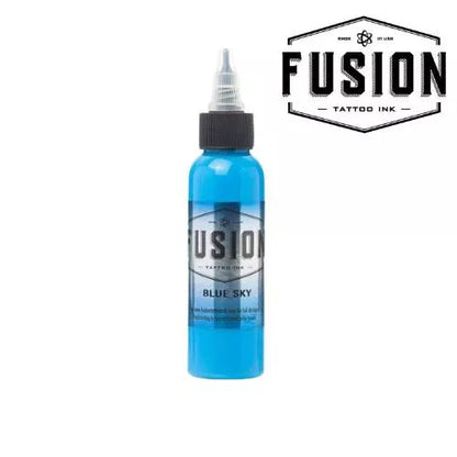 A bottle of Fusion Tattoo Ink in the shade Blue Sky, featuring a bright blue liquid inside a clear bottle with a black cap, shown against a white background with a brand logo overlay in the top right.