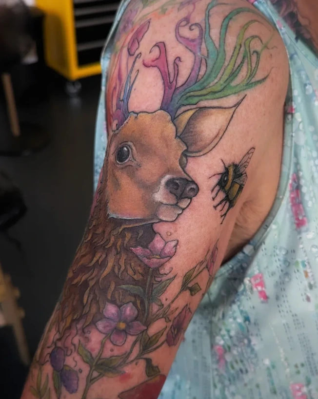 Colourful deer tattoo