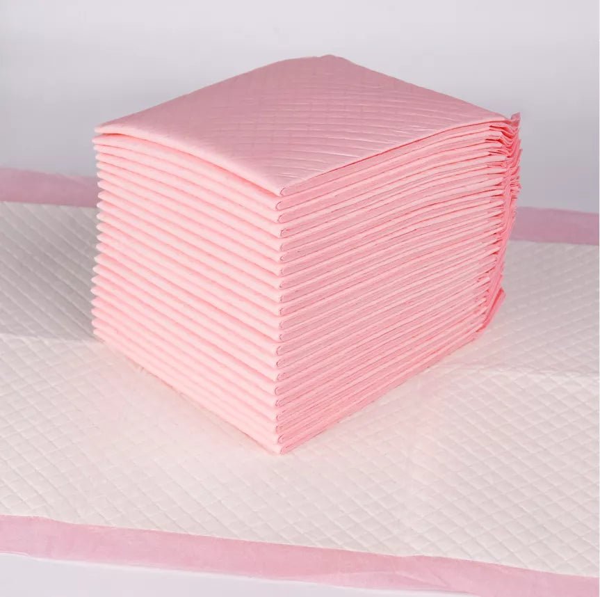 Tattoo absorbent pads for healing and fluid control