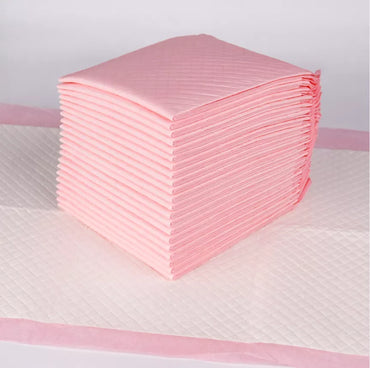 Tattoo absorbent pads for healing and fluid control